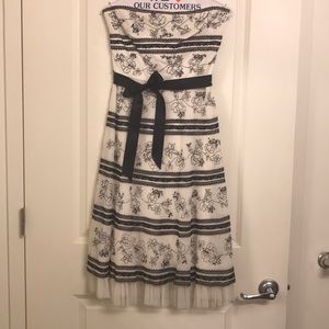 BCBG MaxAzria white drew with black lace.